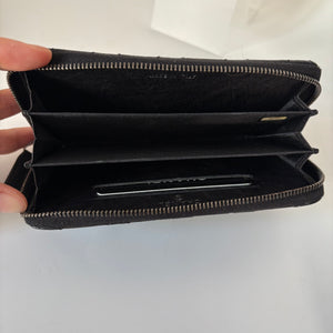 Authentic Chanel Studded Crinkled Lambskin Zipper Wallet Black