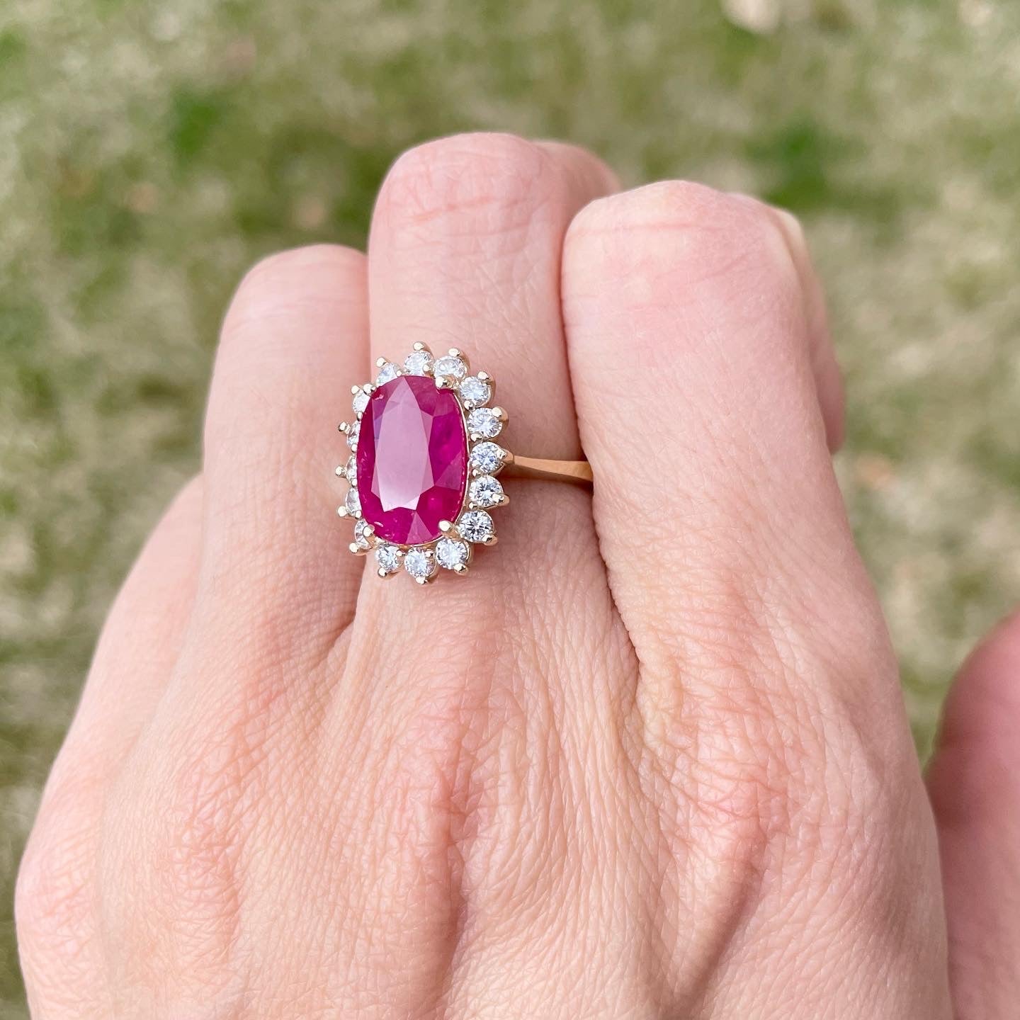 Mozambique Ruby Diamond halo ring set in 14k yellow gold