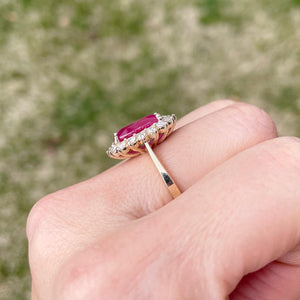Mozambique Ruby Diamond halo ring set in 14k yellow gold