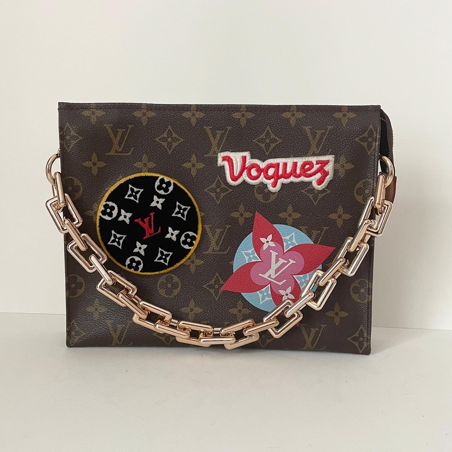 louis vuitton toiletry bag with chain