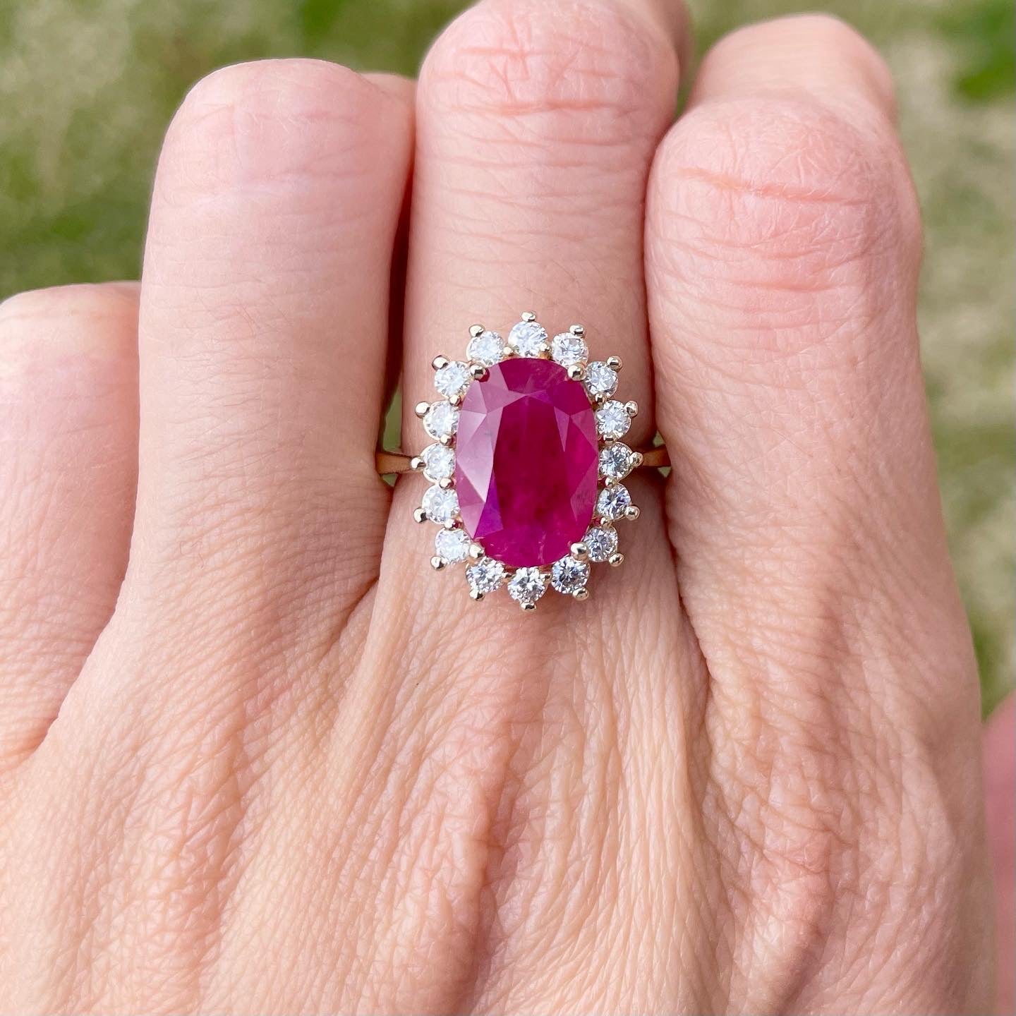 Mozambique Ruby Diamond halo ring set in 14k yellow gold