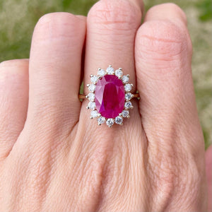 Mozambique Ruby Diamond halo ring set in 14k yellow gold